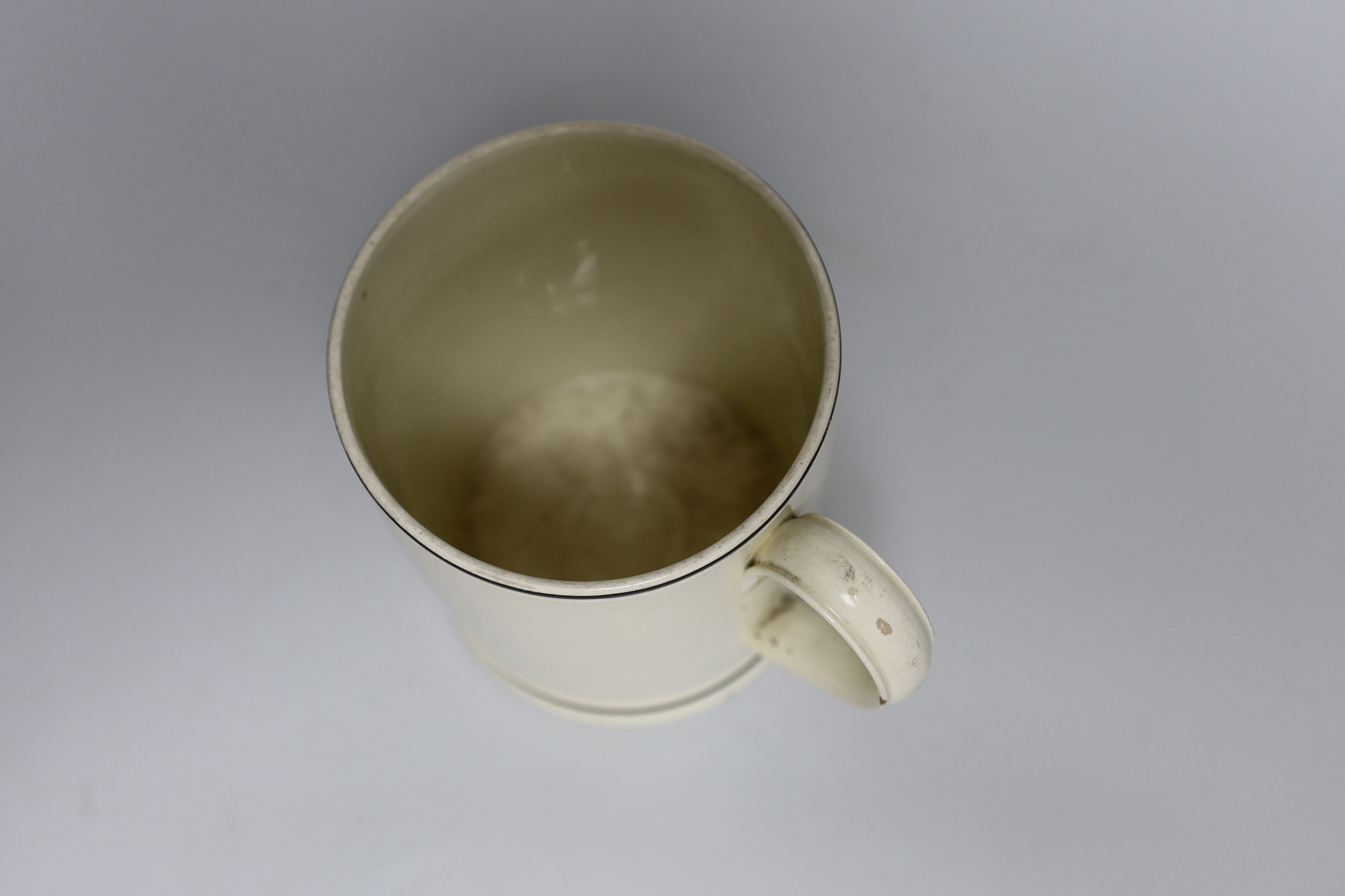 A rare late 18th century creamware cylindrical mug inscribed 'Success to Adml. Nelson’, 14cm high